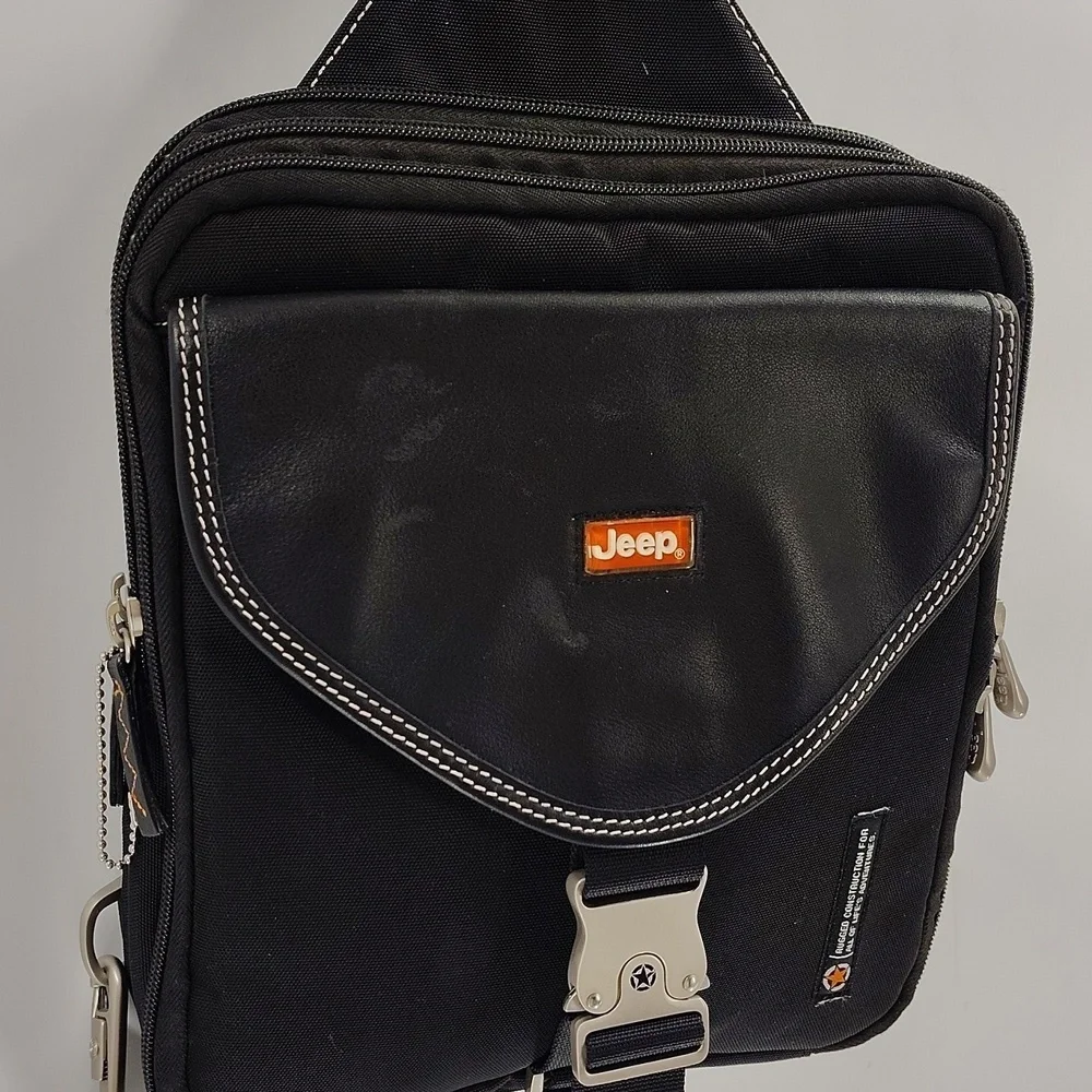 JEEP black multi section crossbody backpack bag multi use adjustable strap